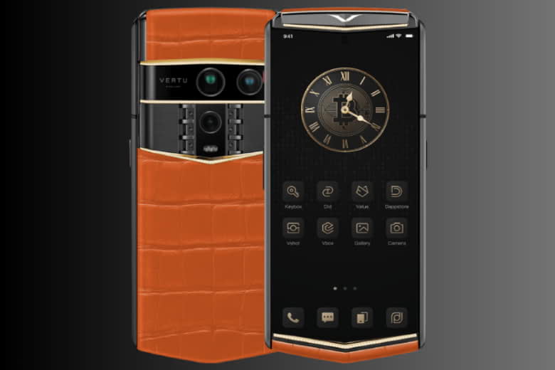 Vertu Agent Q Alligator Quint Gold Diamond Collector’s Edition Radiant Phoenix 1TB là sự kết hợp hoàn hảo giữa công nghệ đỉnh cao và nghệ thuật chế tác thủ công xa xỉ. Đây không chỉ là một chiếc điện thoại, mà là minh chứng cho đẳng cấp và phong cách sống thượng lưu của giới tinh hoa.Thiết kế thủ công đỉnh cao mang dấu ấn cá nhân Vertu Agent Q Alligator Quint Gold Diamond Collector’s Edition Radiant Phoenix 1TB gây ấn tượng mạnh mẽ ngay từ cái nhìn đầu tiên nhờ thiết kế thủ công tinh xảo. Toàn bộ thân máy được chế tác nguyên khối từ hợp kim Titan, mang lại cảm giác chắc chắn và sang trọng. Bề mặt được bọc da cá sấu cao cấp, từng đường vân da được tuyển chọn kỹ lưỡng, mang lại vẻ đẹp độc nhất vô nhị. Các chi tiết viền được mạ vàng và đính kim cương thủ công, thể hiện sự tinh tế trong từng đường nét và sự tôn trọng tuyệt đối với nghệ thuật chế tác. Hiệu năng mạnh mẽ từ bộ vi xử lý hàng đầu Không chỉ đẹp ở ngoại hình, Vertu Agent Q Alligator Quint Gold Diamond Collector’s Edition Radiant Phoenix 1TB còn sở hữu cấu hình mạnh mẽ với chip Qualcomm Snapdragon 8 Elite Supreme tiến trình 3nm. Cùng với đó là bộ nhớ RAM 16GB LPDDR5X và dung lượng lưu trữ trong 1TB, cho phép người dùng xử lý mọi tác vụ một cách mượt mà. Dù là chơi game, làm việc hay giải trí, chiếc điện thoại này đều mang đến trải nghiệm vượt trội, xứng đáng với kỳ vọng của người dùng cao cấp. Màn hình OLED sắc nét kết hợp kính Sapphire chống trầy Vertu Agent Q Alligator Quint Gold Diamond Collector’s Edition Radiant Phoenix 1TB sở hữu màn hình OLED 6.67 inch với tần số quét 120Hz, mang lại hình ảnh mượt mà và sống động đến từng chi tiết. Mặt kính Sapphire phủ toàn bộ màn hình giúp tăng độ bền, chống trầy xước hiệu quả và bảo vệ tối đa trong quá trình sử dụng. Độ phân giải FHD Plus 1080 x 2340 pixel giúp hiển thị hình ảnh sắc nét và chân thực, mang đến trải nghiệm thị giác cao cấp hiếm có. Công nghệ pin bền bỉ và sạc siêu nhanh Dung lượng pin lên đến 5565 mAh giúp Vertu Agent Q Alligator Quint Gold Diamond Collector’s Edition Radiant Phoenix 1TB hoạt động liên tục suốt ngày dài mà không lo ngại về thời lượng sử dụng. Công nghệ sạc nhanh 65W giúp bạn sạc đầy năng lượng chỉ trong thời gian ngắn, tiết kiệm thời gian và đảm bảo hiệu suất sử dụng luôn ổn định. Đây là sự lựa chọn lý tưởng cho những người dùng bận rộn, cần một thiết bị luôn sẵn sàng đồng hành trong mọi hành trình. Hệ điều hành VAOS tối ưu bảo mật và cá nhân hóa Vertu Agent Q Alligator Quint Gold Diamond Collector’s Edition Radiant Phoenix 1TB được trang bị hệ điều hành VAOS độc quyền, phát triển riêng cho dòng sản phẩm Vertu. VAOS không chỉ tối ưu hóa hiệu suất hoạt động mà còn mang đến khả năng bảo mật cao và cá nhân hóa trải nghiệm người dùng. Giao diện thân thiện, trực quan và dễ sử dụng, phù hợp với mọi nhu cầu từ công việc đến giải trí, đồng thời bảo vệ tối đa dữ liệu cá nhân và giao tiếp riêng tư. Camera chất lượng cao phục vụ mọi khoảnh khắc Với cụm camera sau 50MP và camera trước 32MP, Vertu Agent Q Alligator Quint Gold Diamond Collector’s Edition Radiant Phoenix 1TB không hề thua kém các flagship hiện đại. Camera cho phép chụp ảnh sắc nét, chân thực trong mọi điều kiện ánh sáng, đồng thời hỗ trợ quay video độ phân giải cao. Đây là trợ thủ đắc lực cho những người yêu thích lưu giữ khoảnh khắc và cần một thiết bị có khả năng nhiếp ảnh chuyên nghiệp. Kết nối toàn cầu và chuẩn kết nối thế hệ mới Vertu Agent Q Alligator Quint Gold Diamond Collector’s Edition Radiant Phoenix 1TB hỗ trợ đầy đủ các chuẩn kết nối từ 2G đến 5G, Wi Fi 7, Bluetooth 5.4 và NFC. Điều này cho phép người dùng dễ dàng kết nối và truyền tải dữ liệu với tốc độ cao, đồng thời tương thích với mọi hệ thống mạng trên toàn cầu. Khả năng hỗ trợ hai SIM giúp người dùng linh hoạt hơn trong việc quản lý công việc và cuộc sống cá nhân. Mua Vertu Agent Q Alligator Quint Gold Diamond Collector’s Edition Radiant Phoenix 1TB chính hãng tại Vertu Việt Nam Vertu Agent Q Alligator Quint Gold Diamond Collector’s Edition Radiant Phoenix 1TB